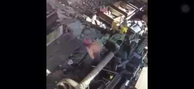 Factory worker gets dragged in through industrial lathe