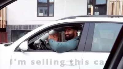 This man is too big for his car