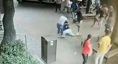 man is beaten after hitting woman in public square in brazil
