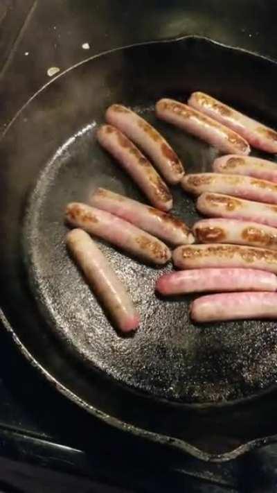 How can I motivate the other sausages to cook themselves evenly? Is it genetic or are they just lazy?