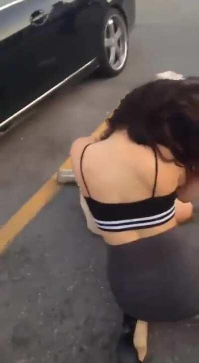 Two girls many fists.