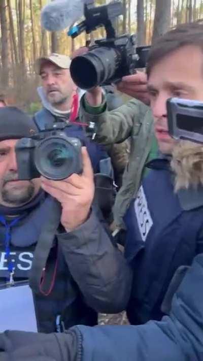 Journalists were shown the mass grave in the village of Motyzhyn in the Kyiv region, which was found after the retreat of the Russian military.