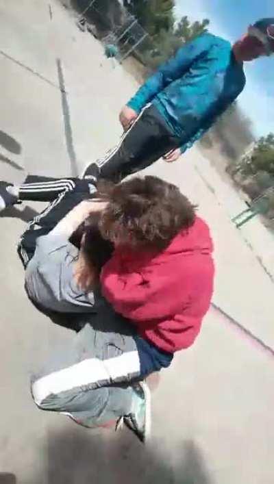 After school fight. Kid in gray apparently snitched on kid in red for smking. Not my fight.