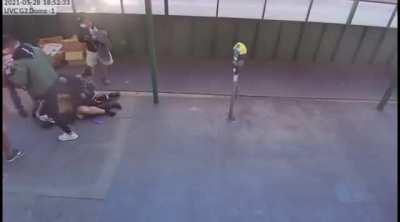 San Francisco police officer gets attacked while responding to a call about a hobo who was threatening asian people, and several bystanders jump in to help