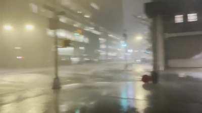 It’s raining so hard the manhole covers are being blown off…