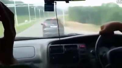 Guy driving like an idiot,tailgates a man who is driving with his wife and child. The idiot then passes and brake checks the family and corners them in with no escape leaving the dad no option but to protect his family. Idiot driver gets a lesson in 