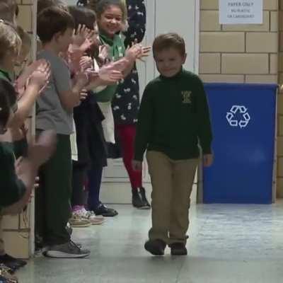 Six year old kid got welcome back to school with a standard ovation after beating Leukemia ( sorry if not fit here)