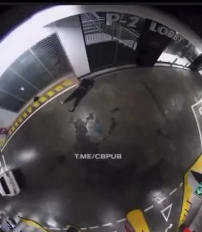 Shotgun close up drive by in parking garage