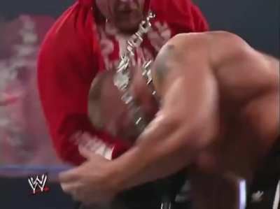 Brock Lesnar tries to hang The Undertaker with a biker chain, before The Undertaker gives one of the best chokeslams of all time to Lesnar.