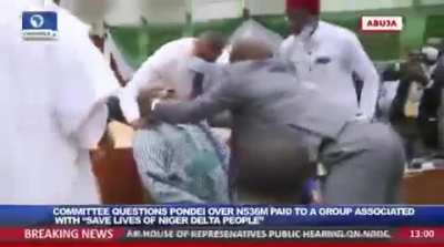 Nigerian official pretends to faint after being questioned about missing funds