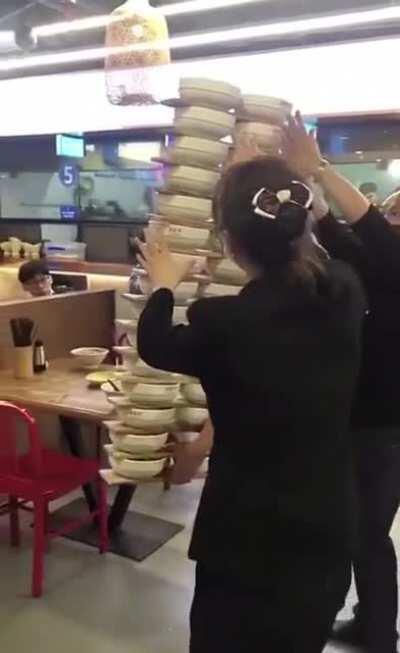 Waitress Plays Jenga With Noodles