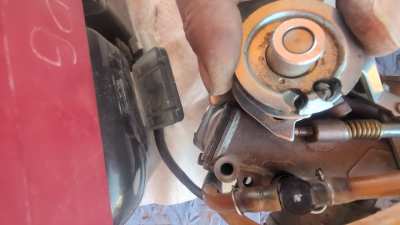 Tightening up the throttle cable wheel?