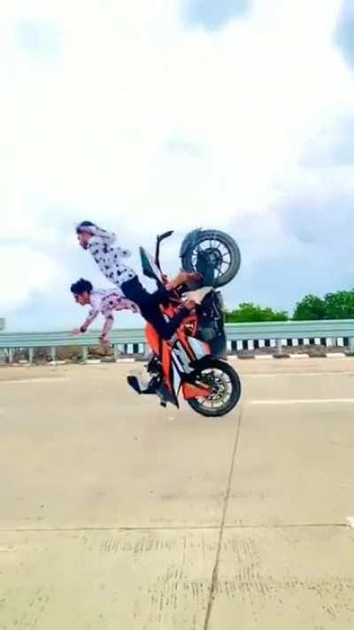 Doing bike stunt without any safety gear