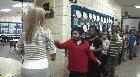 Teacher has a personalized handshake for each of her students