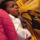 Her mama isn't home and she wouldn’t take the bottle, so he had to improvise.