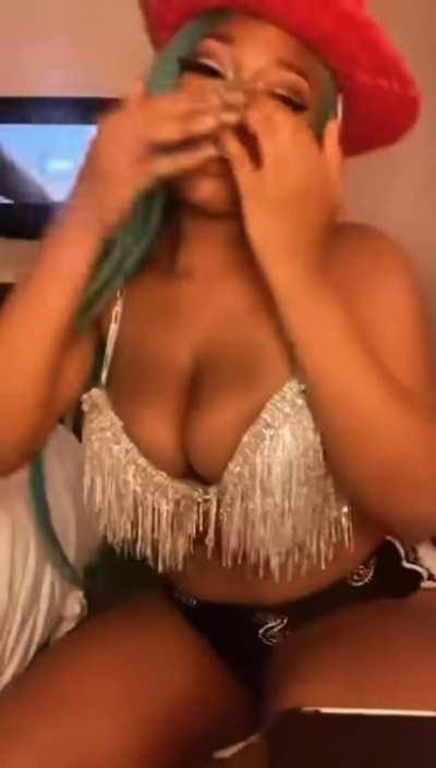 MeganTheStallion shaking her ass and showing her cleavage