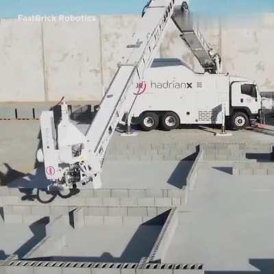 This block-laying robot, builds block structures from a 3D CAD model, producing far less waste than traditional construction methods