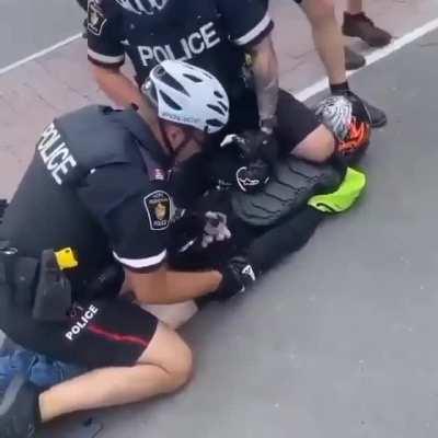 Biker cops take out biker burning rubber. Out of his pants.
