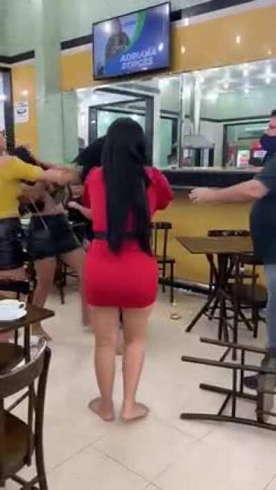 Girls in mini skirts and short dresses scraping at a restaurant