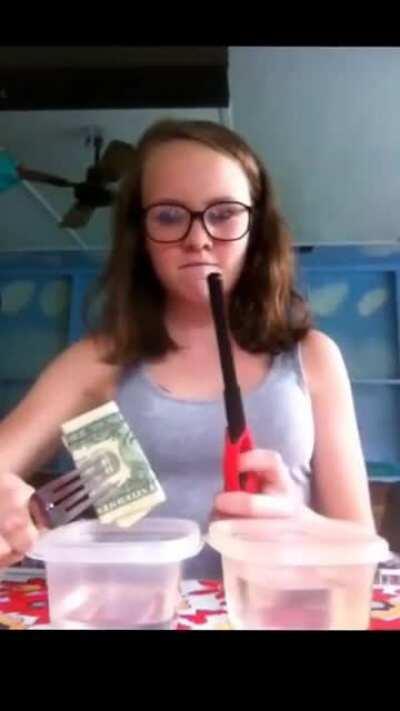 Burning a dollar bill