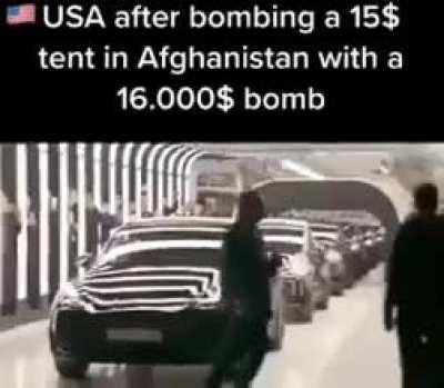 Elon Musk dancing in front of a black and white-striped tunnel with some sort of rap song in the back (looking for both the video and the music)