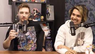 Connor tries to drink his water, forgets his mic is in the way