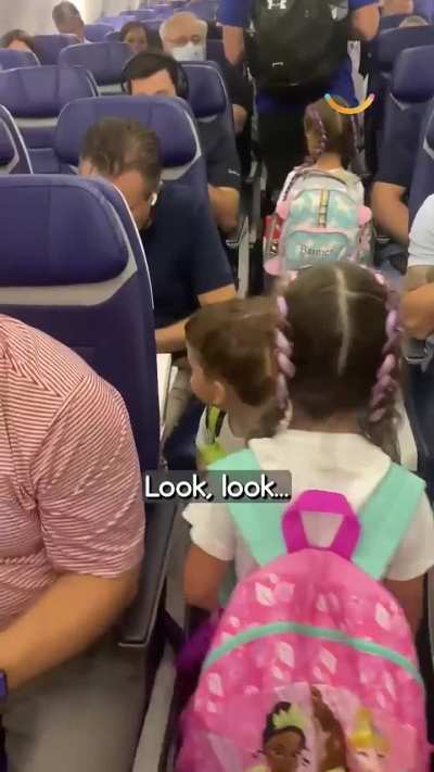 Kid Goes Around the Plane Showing His Favourite Bag, Passengers Make Sure to Compliment It