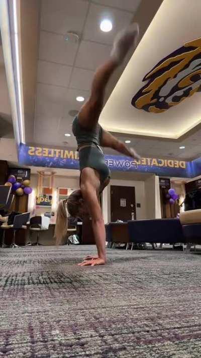 Livvy does a handstand