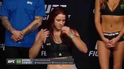 Her track pants cannot contain it (Norma Dumont).