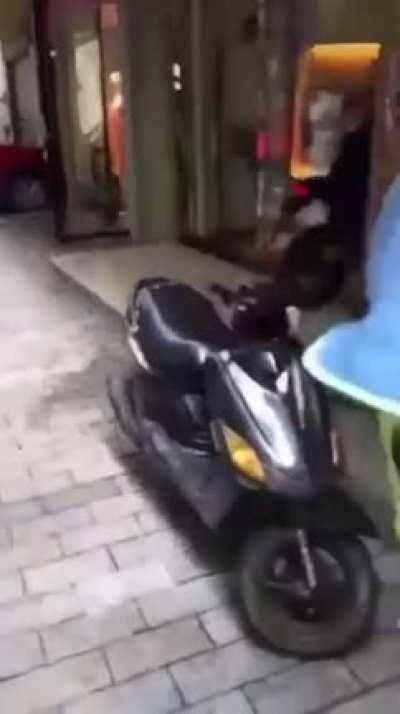 if I rev my motorcycle next to this glass building?