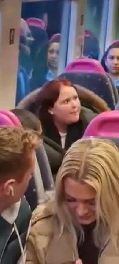 Girl starts shouting at people after being told to turn her music down and to stop vaping on a train at 7 in the morning