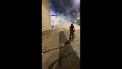 Charlotte Mecklenburg Police Department trap protesters between two lines of riot officers and parking garages and fire pepper bullets, tear gas, and flashbangs into the crowd