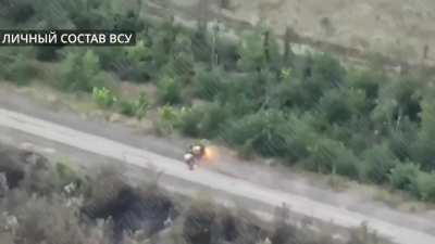 RU POV: FPV Drone strike on Ukrainian soldiers riding an ATV, vehicle catches fire, wounded soldiers or KIA.