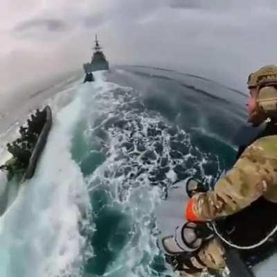 Marines perform boarding exercise with Jetpacks.