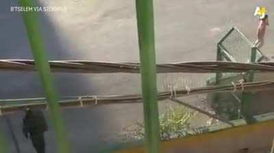 Israeli Officer taking a bike from an 8 years old girl