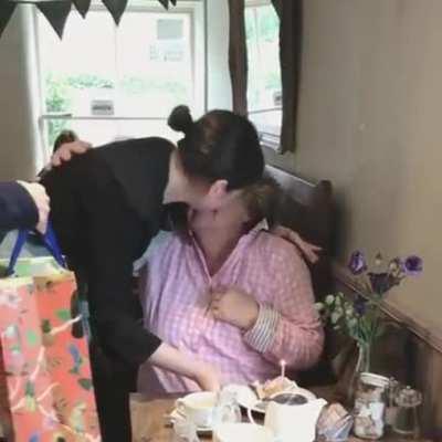 A regular customer's heartwarming reaction to a free cake on her birthday .