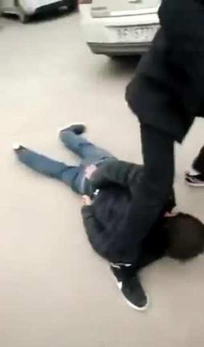 Chinese Police -- savagely beat Uighur who is in handcuffs