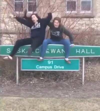 WCGW sitting on a sign
