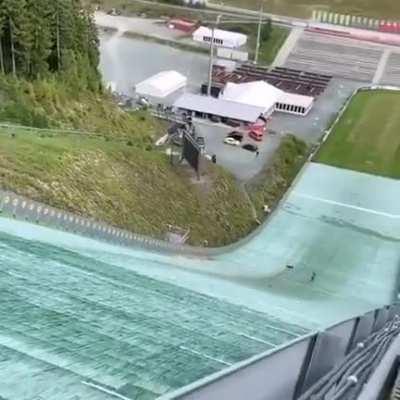 WCGW jumping a ski jump with a bike