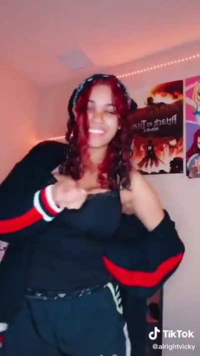 Damn near bout to fall out the shirt 