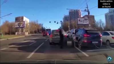 Dude was probably angry about how caked in dust that dude's car is...
