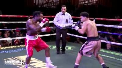 Rolando 'Rolly' Romero KO's Dieumerci 'Elephant' Nzau.