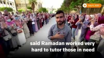 Hundreds of university students in Egypt formed an 'honorary corridor' to thank fellow student Ahmed Ramadan for helping them study and pass their exams [Reuters, source in comments]