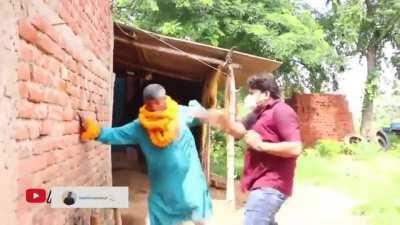 Reporter slapped local politician for arranging public gathering without wearing a mask.