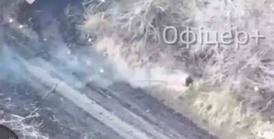 Russian tank is destroyed by the birds of Magyar. A Russian soldier burns.