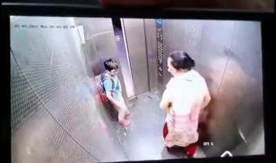 a dog bites a kid at a housing society in India, look at the reaction and the body attitude of the owner its literally like 