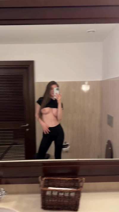 Busty hottie in the mirror