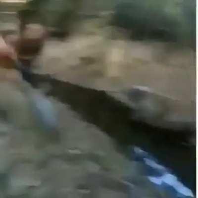 Idiots fighting an mortar ammunition