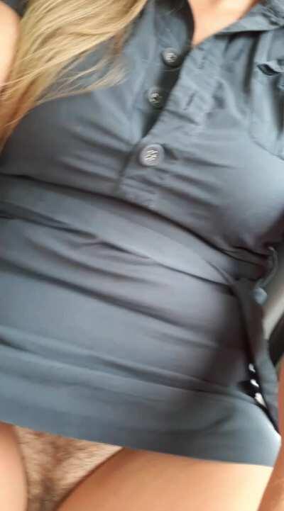 Riding around in a dangerously short dress.