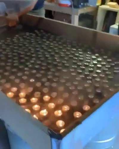 Extinguishing candles using Sulfur Hexafluoride.